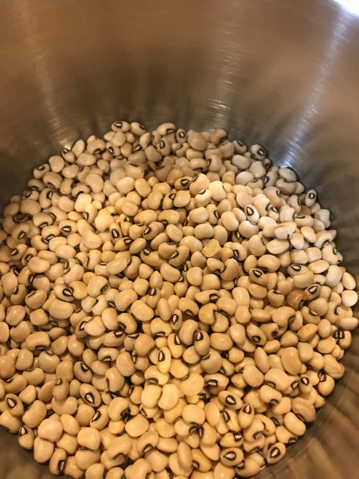 Pick through the dried black eyed peas before cooking. You're looking for little rocks or pebbles. You won't find them often, but it sometimes happens. You'll sure know it if you bite into one - so give it a quick look before cooking.
