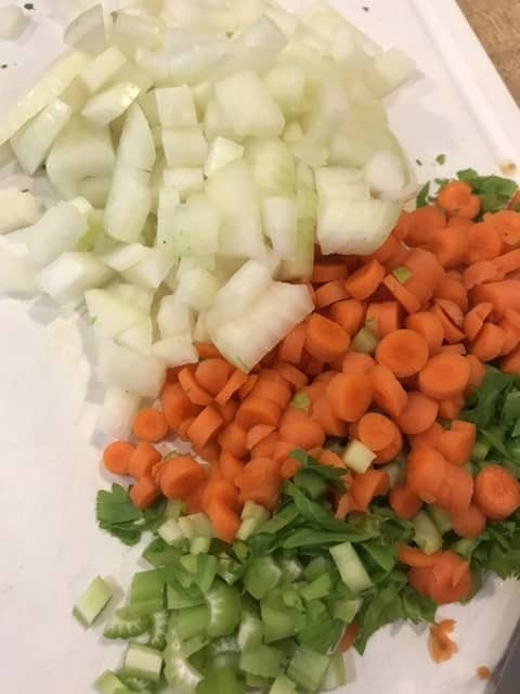 Add the vegetables - carrot, onion garlic and celery to the pot and stir well. Cook just a few minutes until the onion is fragrant and the vegetables are beginning to soften.This takes only about 5-7 minutes, stirring occasionally.