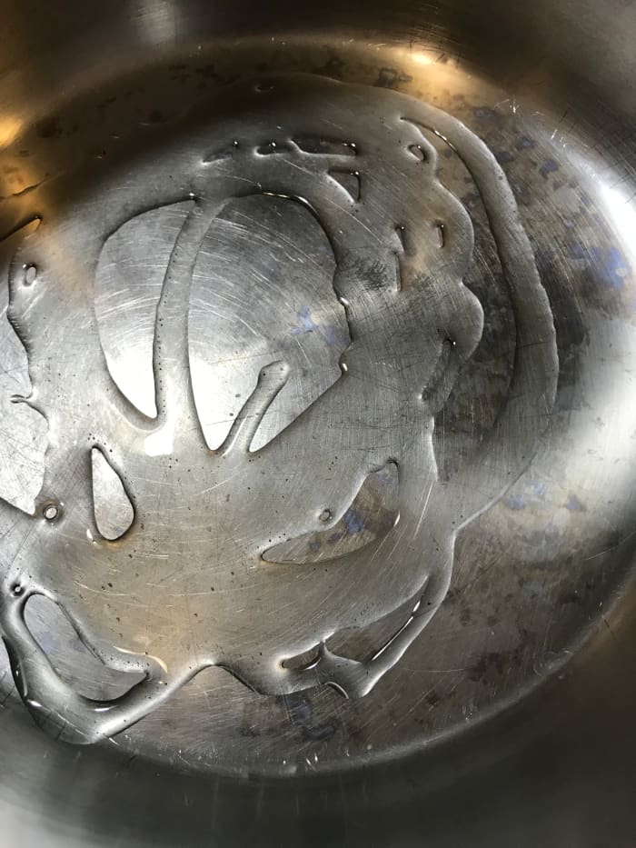 I like using a nice sized soup pot. Place it over medium heat, and add just a couple of teaspoons of olive oil. You'll use it to saute the vegetables.