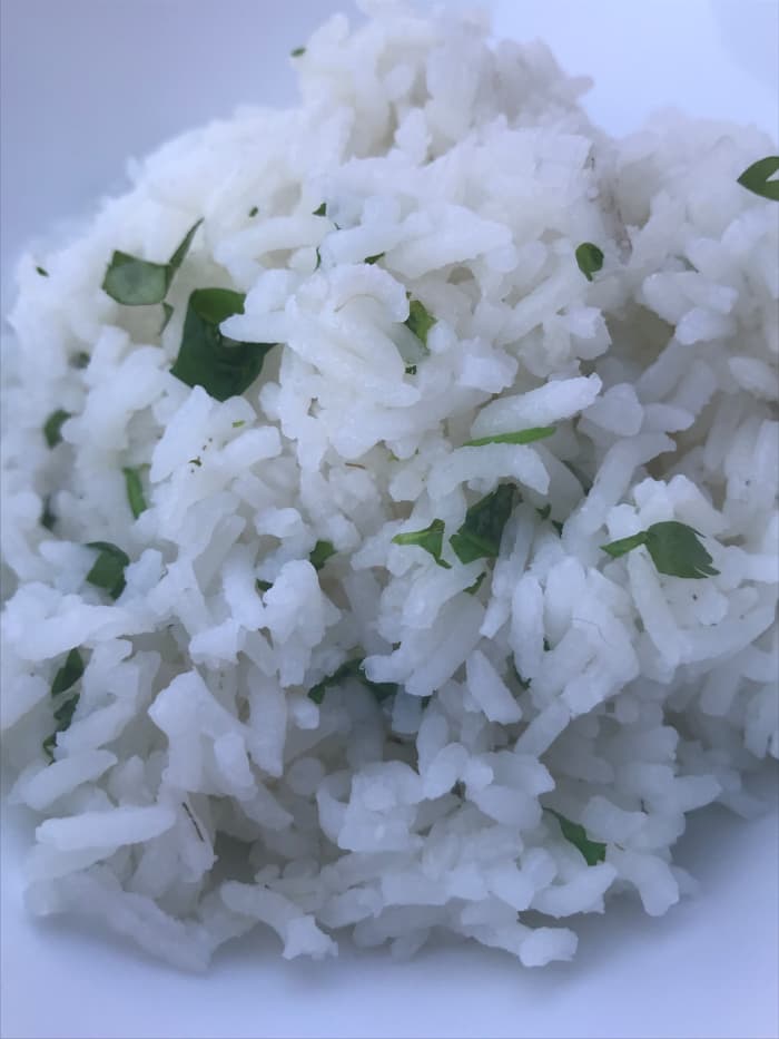 Serve the rice immediately, although honestly - leftovers are great too. We make fried rice with ours, or throw it into a burrito. All great!