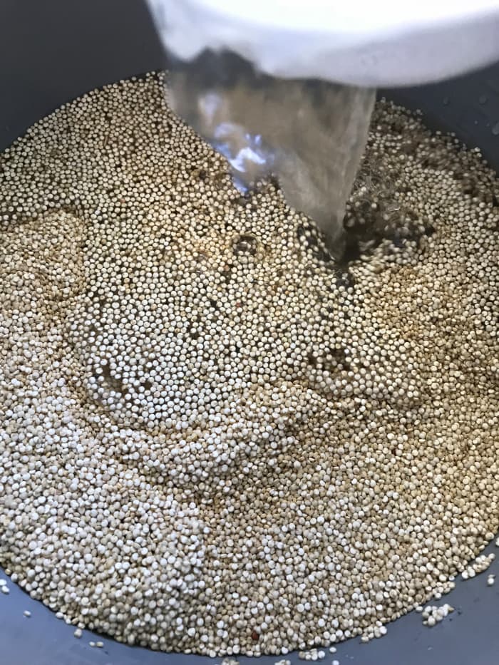 Quinoa can be cooked with just plain water, and I do that all the time. But feel free to up the flavor with any kind of stock you wish. Beef, chicken or vegetable stocks all work great, as does adding just a splash of wine or really good vinegar.