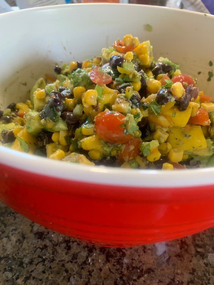 Avocado, black bean, mango salsa is great for summertime picnics . . . or any time of year. Always a crowd-pleaser!