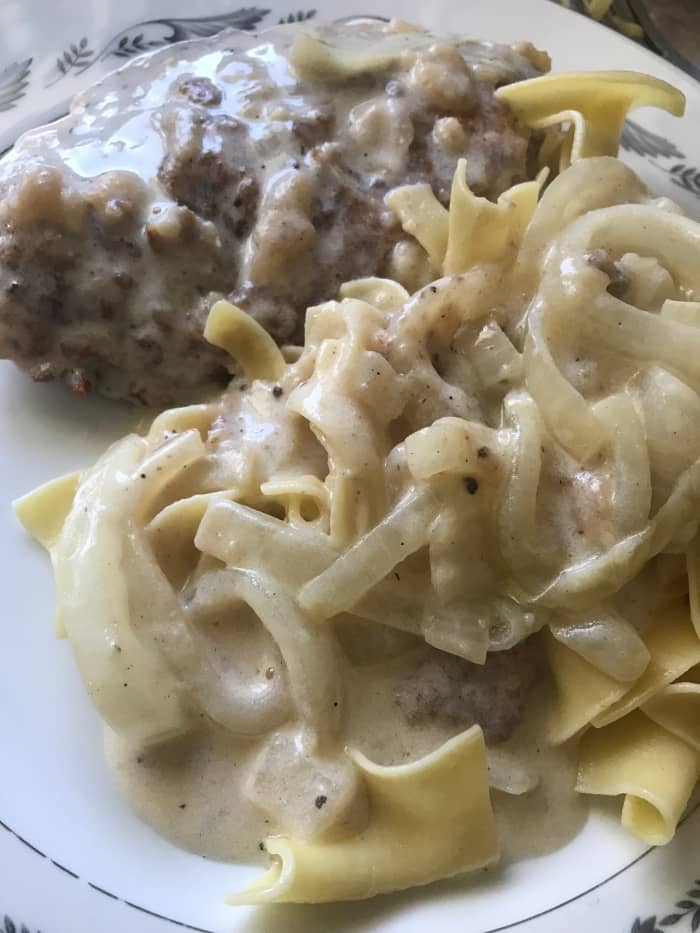 You can serve chicken fried steak with either buttery egg noddles or creamy mashed potatoes. Either one works great for serving up extra helpings of the delicious, rich onion gravy that's a snap to prepare.