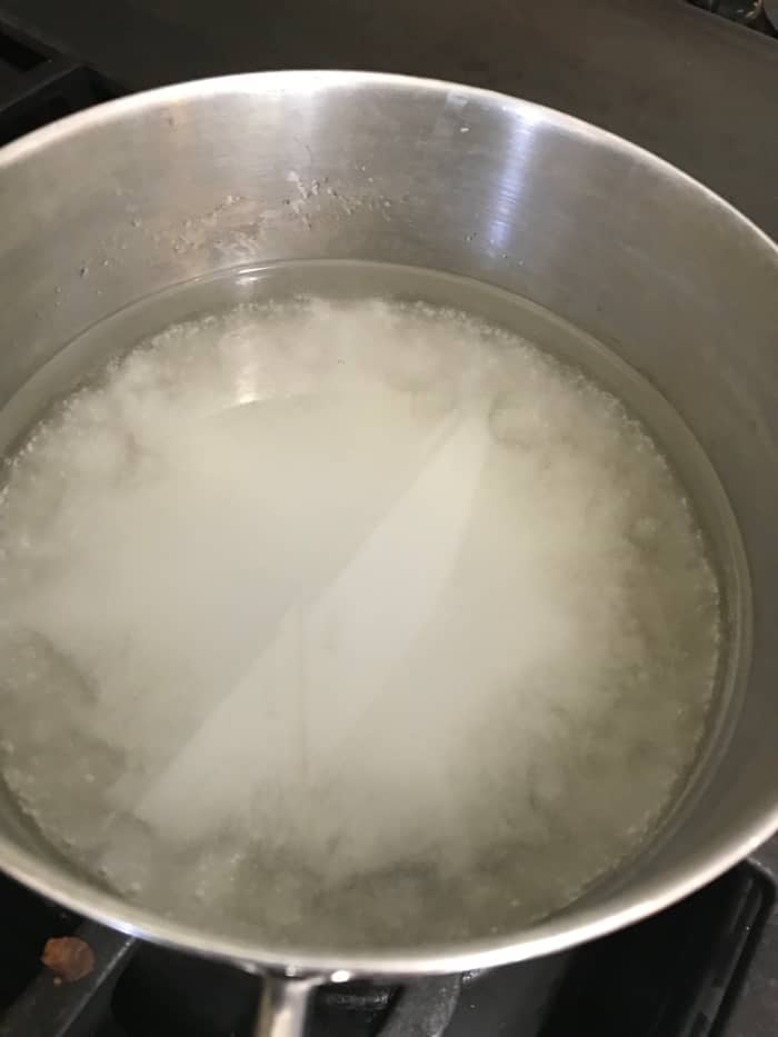 Simple syrup is nothing more than sugar water—usually made with equal parts sugar and water. This ratio also helps keep the final sorbet scoopable once hardened off in the freezer.
