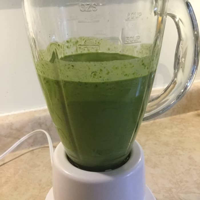 Step 2: Add the wet ingredients to the blender and puree. If your blender is anything like mine, you may have to add the spinach in batches.