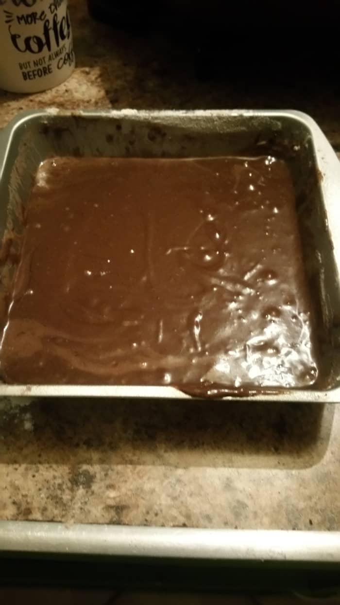 Preheat oven to 350ºF and bake for 35 minutes. Each oven is different, so the minutes may vary. When you insert a knife in the middle of the cake and it comes out clean, then you know it is done. Let it cool before you frost.