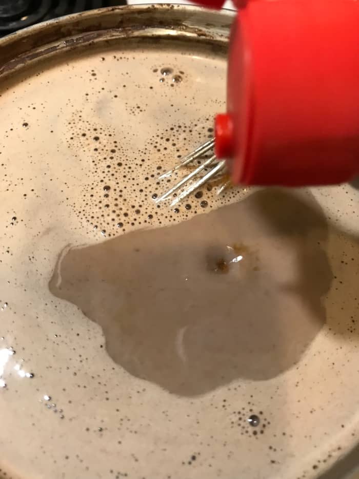 Remove the hot chocolate from the heat before stirring in the vanilla. Vanilla extract is usually dissolved in alcohol, which will dissipate in heat. Adding it last helps retain the most flavor.