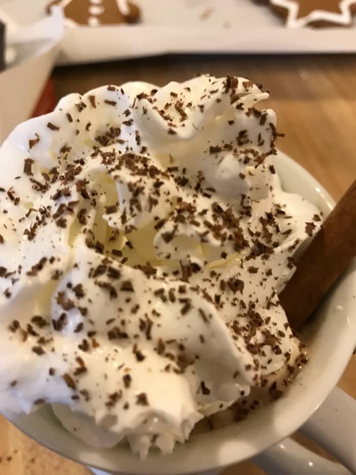 Grate a little semi sweet chocolate over the top of the whipped cream. This adds almost nothing in terms of flavor, but it does make it look amazing for almost no additional effort. Add a cinnamon stick to the whipped cream.