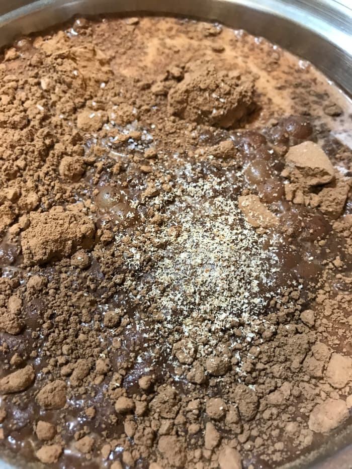 Add the spices and bring to a simmer. You really don't have to cook anything, all you need is to dissolve the sugar, wake up the spices and blend the flavors. Once that's done, it's ready at whatever temp you like it.