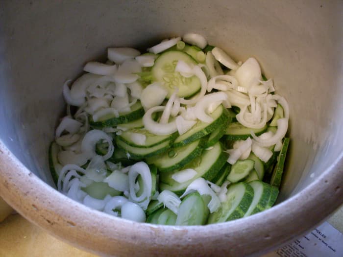 A stoneware pickling crock is a worthwhile investment, but if you don't have one, use a large mixing bowl.