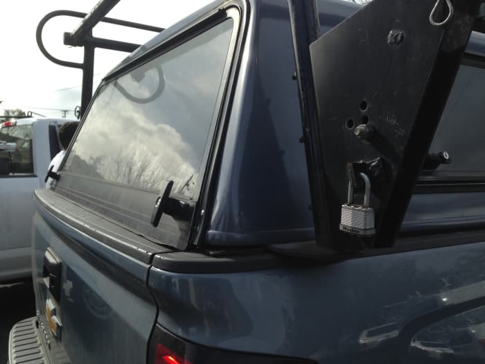 Notice how it sits on the back tailgate-where the rear door now, on new tops, molds over the top of that tailgate.