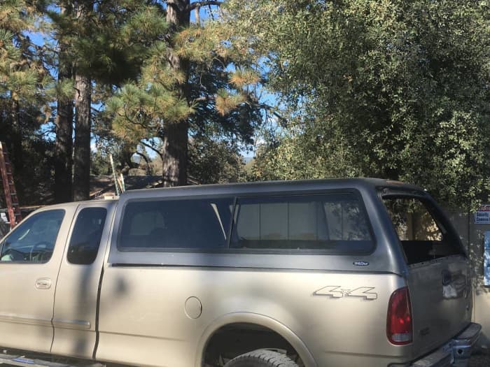 Notice how much taller the Superduty top is, and how it 'hooks' in the rear corners to cover up the F250 bed caps.