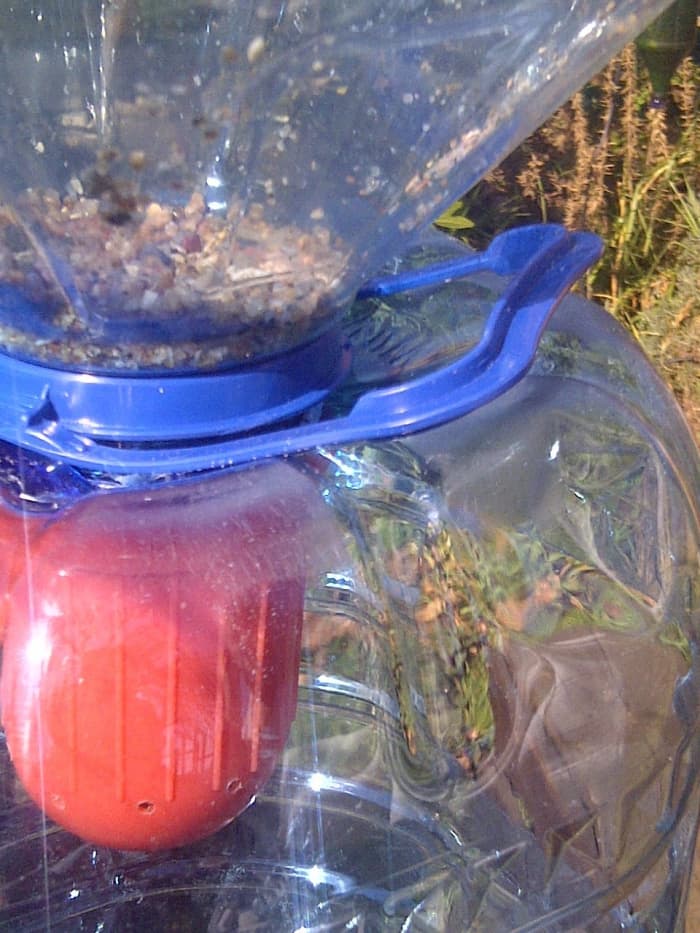 Fill all the bottles with some gravel at the bottom and put the printer cap in place to secure the two bottles.