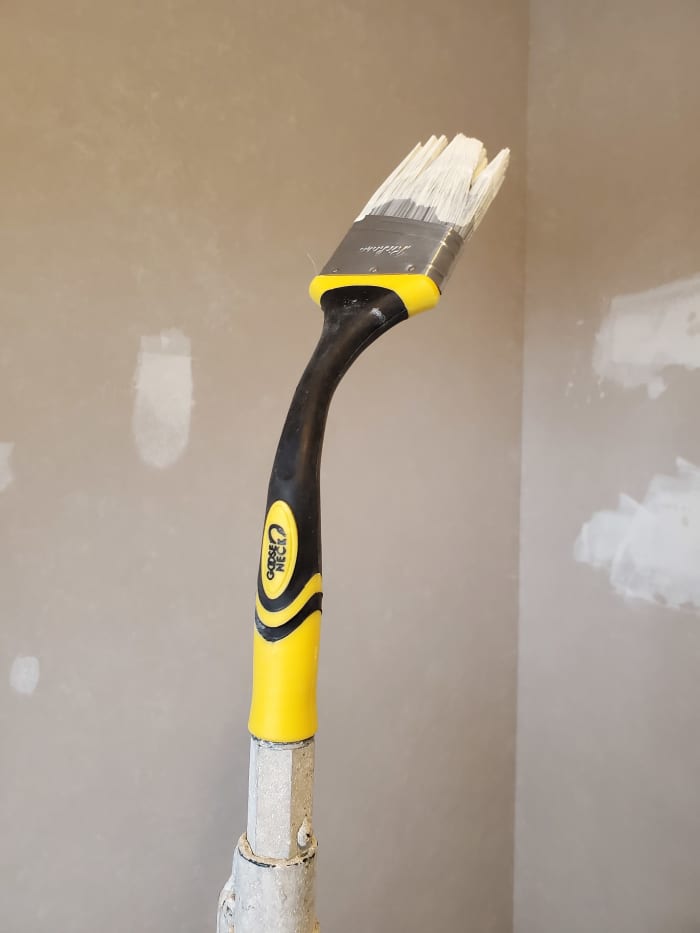 This is a bendable extender brush that screws onto a painting pole. Is it useful? Is it worth buying?