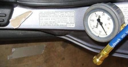 OEM tire pressures are usually posted on the driver's door jamb. This one suggests 32 psi for a stock 205x50R16 tire. I use a piece of drywall for chalk and a good quality tire gauge.