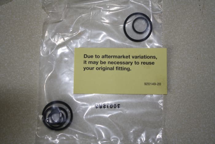 Two sets of pump-to-reservoir seals for different applications. Use the ones that are slightly taller than the recess so they will press tight against the reservoir body when assembled.