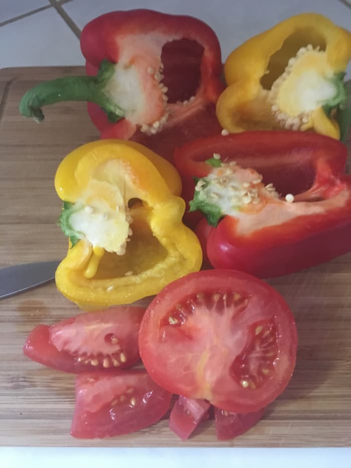 No need to buy seeds when seeds already come with the vegetable. Pepper seeds and tomato with seeds.