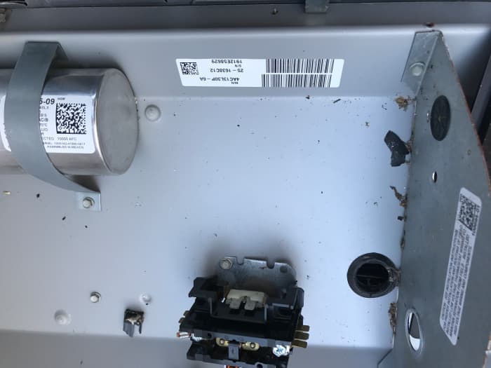 Here is one example of what a sticker inside the A/C service panel may look like and be located. (top center)