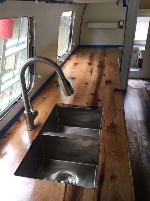 Here is the 12' countertop I made for a 24' Airstream. We more than doubled the counter space in order to create a nice workspace. We also added a deep, under-mounted stainless sink.