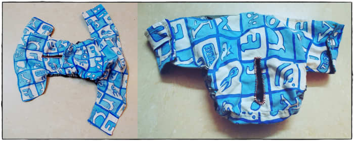 Perci's cloth diaper. It is new so buttons are not yet sewn because she still has to grow a little bigger. Velcro tape can also be used instead of buttons.