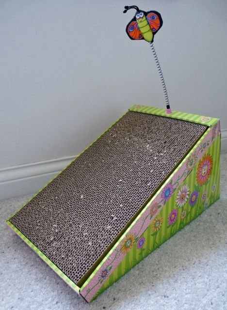 A corrugated cardboard scratching ramp for cats
