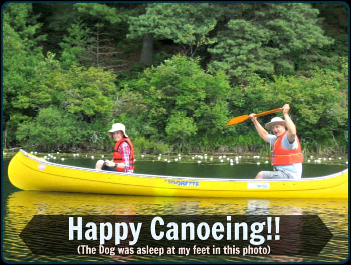 Using the tips in this article will help you have a successful canoe trip with your dog. Rufus is hiding in this photo. He was sound asleep at my feet in the bow of the canoe.
