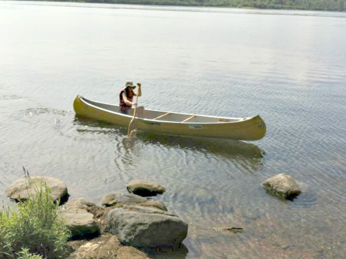 If your dog is reluctant to get in the canoe with you, try paddling out from shore just out of reach from your dog. If your dog wants to be with you, this will help them see they need to hop in or get left behind.