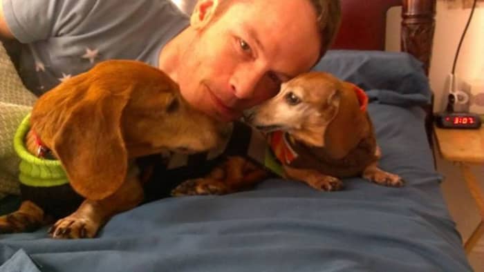 Me with Hallie and Perrin. Hallie (RIP) and Perrin, two dogs who benefited tremendously from rescue organizations.