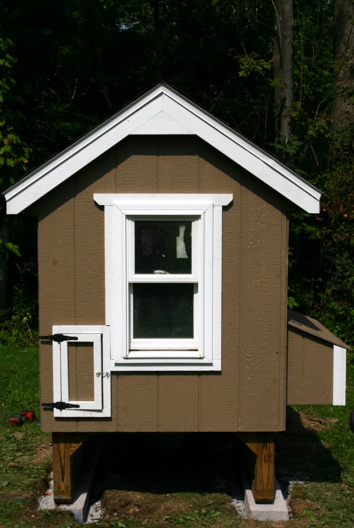 This chicken coop is elevated off the ground to provide proper air circulation and as an added barrier to small predators.