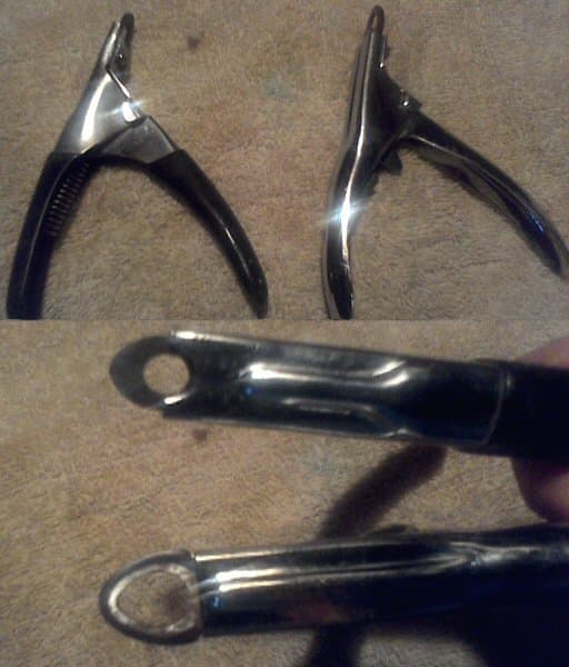 The classic nail cutter: the guillotine. Note the different sizes for the cutting area. The hole has to be big enough for the nail to fit inside.