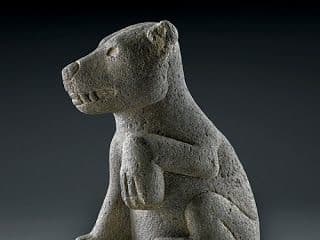 Mayan Chihuahua Statue. This statue, found on Easter Island, resembles the dog statues in ancient Aztec ruins. Note the raised paw.