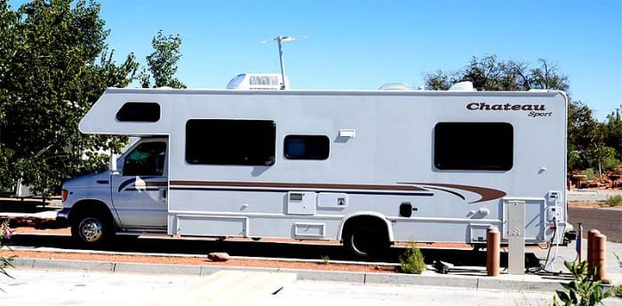 Class C motorhome; the drivers compartment is narrower and shorter than the rest of the RV.