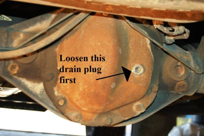 Loosen this first with a 3/8" drive ratchet to ensure you are able to budge it. You don't want to drain your fluid only to realize you can't refill it.