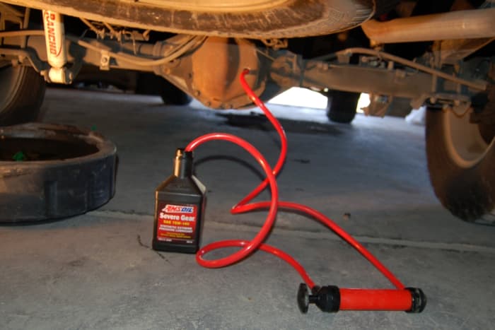 This can be done with a nipple that sometimes comes with the oil bottle. If not, you'll need a transfer pump.