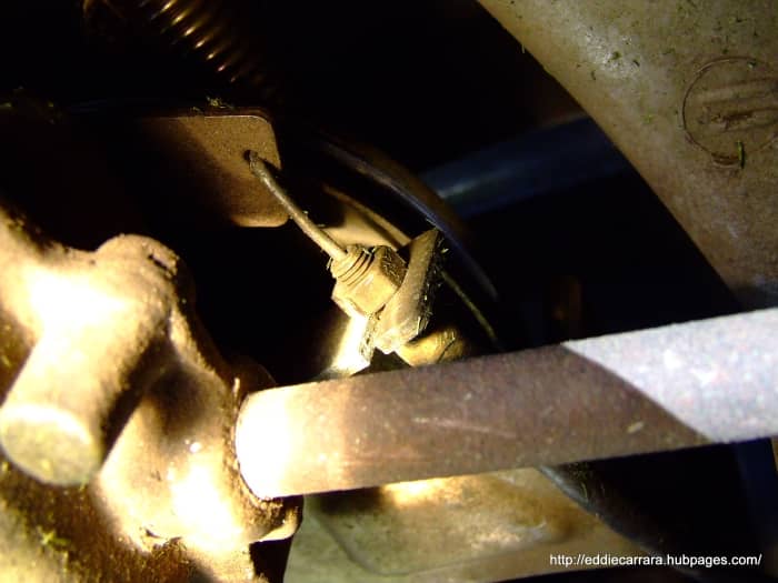 Remove the shift cable on the Honda Harmony 215, it's a10 mm nut. You need to either remove the shift cable from the hand lever or put the transmission in 1st gear to give the cable slack.