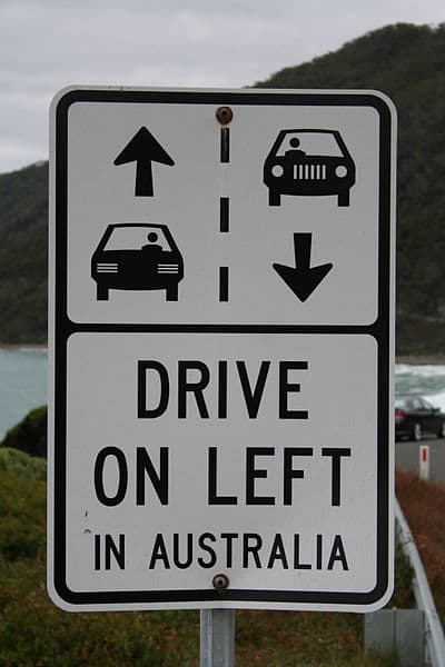 Australian road sign reminding foreign visitors of which side of the road to drive on.