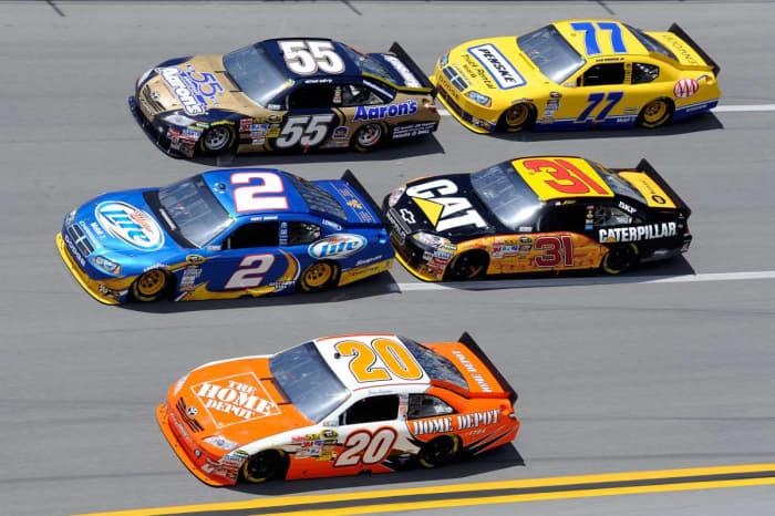 An example of regular (not bump) drafting. The car in back pulls up close to the bumper of the car in front