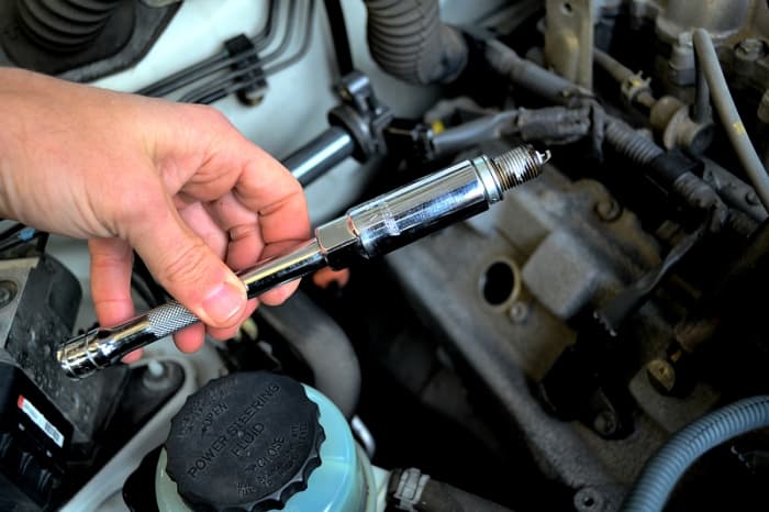 With the plug back in the socket, re-insert the plug into the tube and gently re-thread it into the block by hand. Do not use the ratchet initially, just run it in by hand so you don't damage the threads.