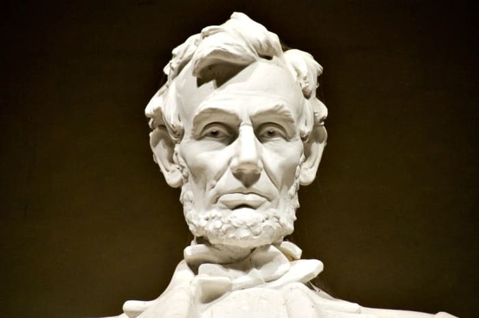 Abraham Lincoln oversees Washington, DC, from the marble seat in his memorial. Visiting him is awe inspiring.