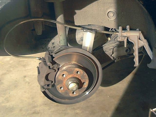 You can use a manual vacuum pump to bleed the caliper and brake line or get the help of an assistant.