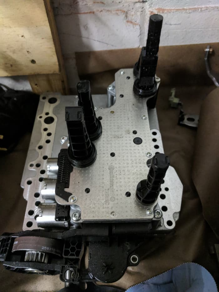 This control module from a Powershift transmission is an example of a mechatronic that is housed inside the transmission itself. Note the black sensors protruding from the back.