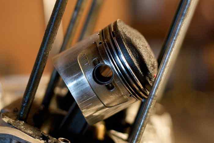 Carbon buildup on pistons and valves will increase engine temperature.