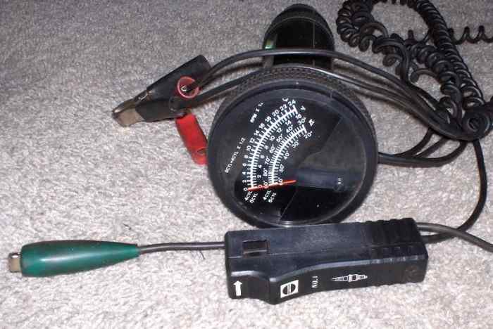 Use a timing light to check ignition timing.