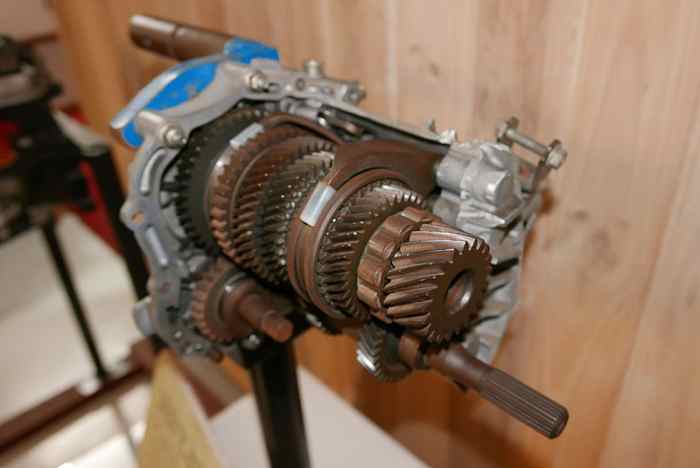 Worn or broken transmission gears can cause noise as well.
