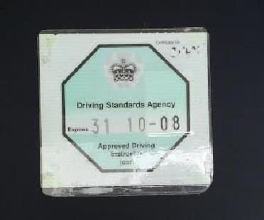 Approved Driving Instructor - the octagonal green badge is your ADI licence to teach!