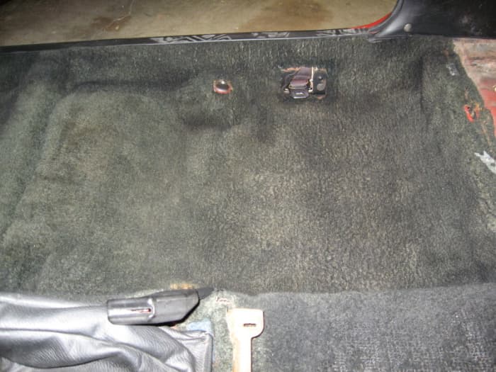 After shot of the right rear foot-well and part of the hump; greatly improved, even though the hump is still quite bald.