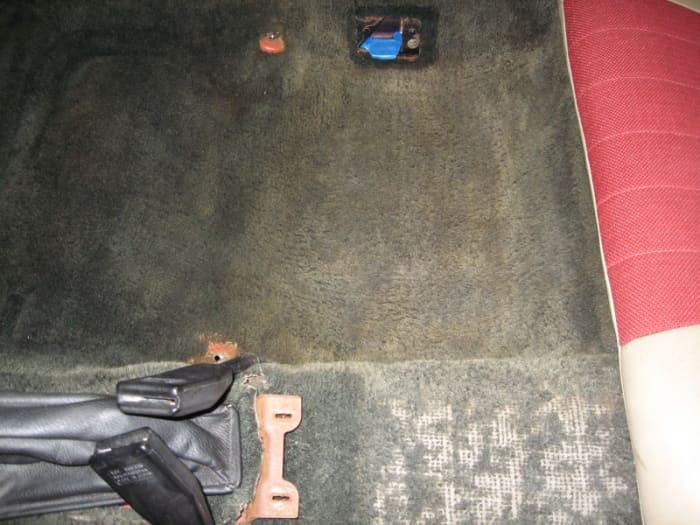 Before shot showing the right rear foot-well and the rather bald carpet on the drive-shaft hump. By the way, this would have been a prime candidate for total carpet replacement.