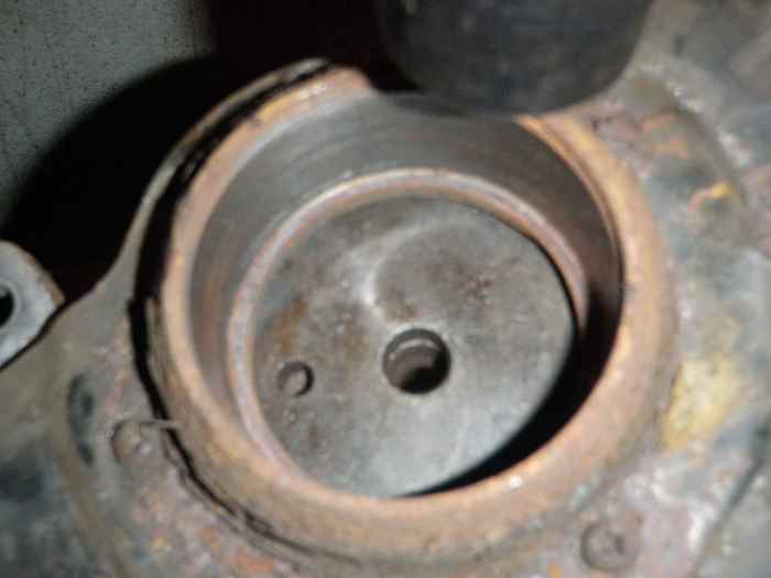 Support the bottom of the knuckle assemble and press the new bearing in.