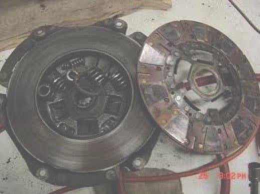 Clutch disc and pressure plate. The clutch looks like it blew apart. If you ride your clutch it may look like this.