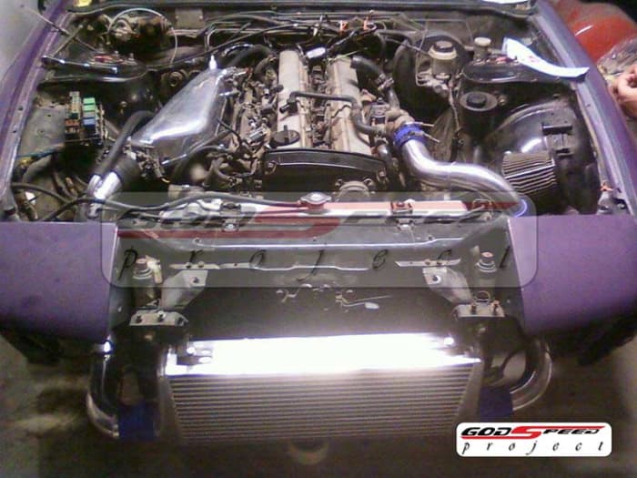 The OEM lower manifold runners are retained in order to maintain good low to mid range torque characteristics.